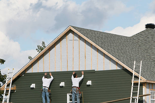 Professional Siding Installation technician working in Mooresville, NC